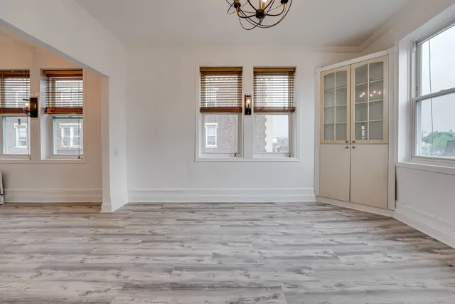 a view of empty room with windows