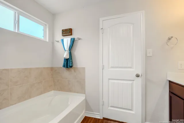 a bathroom with a bathtub