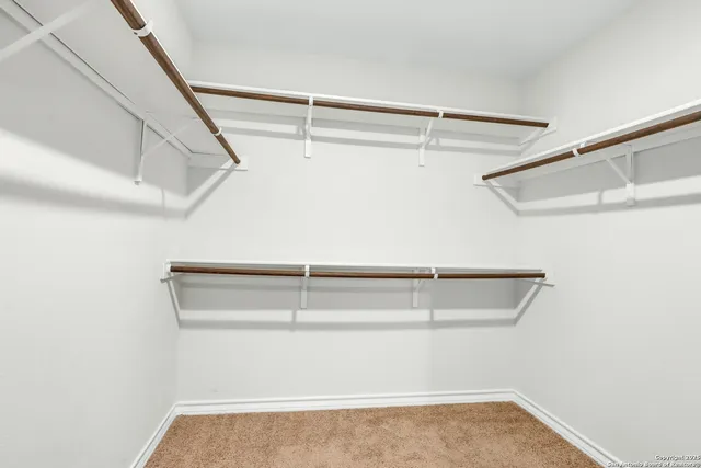 a view of a room with racks on the wall