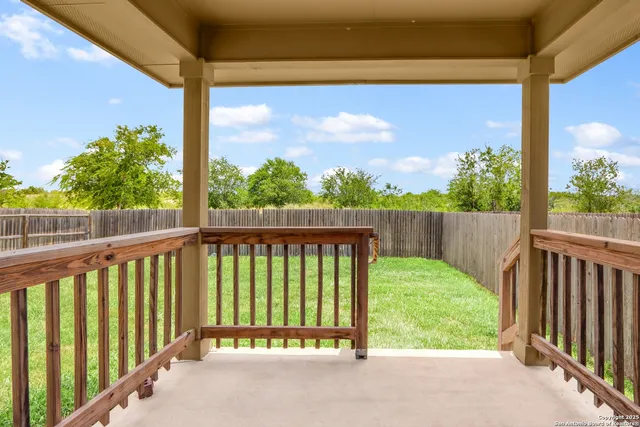 a view of a porch with a yard