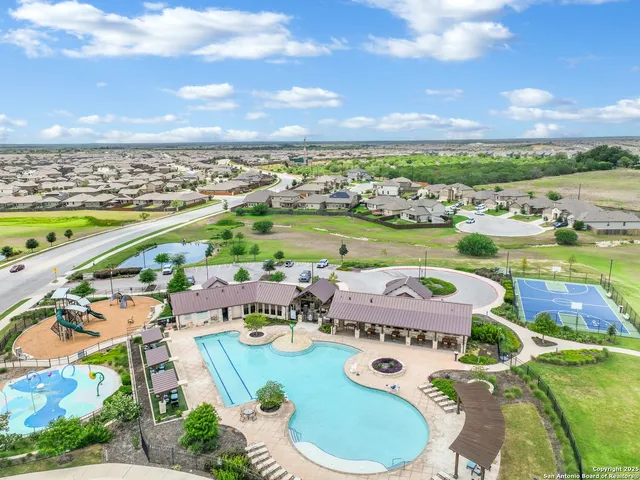 a view of a city with lawn chairs