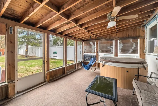 a room with furniture and a large window