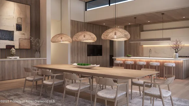 a kitchen with a table and chairs in it