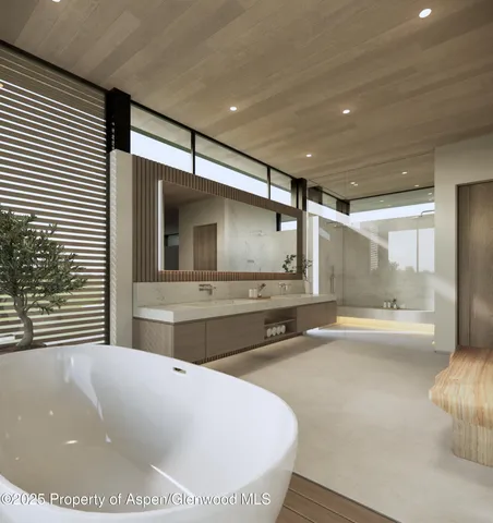 a large kitchen with a large window and stainless steel appliances