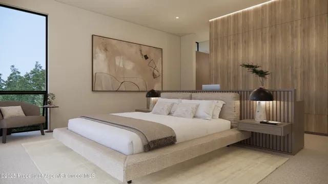 a bedroom with a bed and a couch