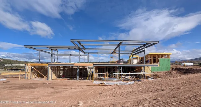 a picture of a bench in front of a window