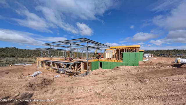a black and white photo of a living room
