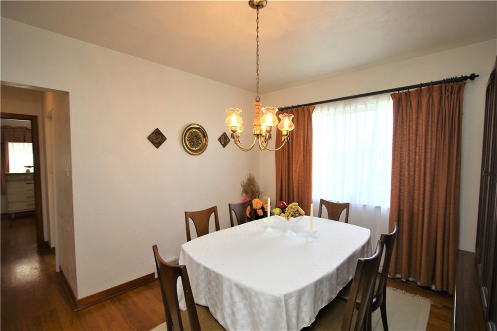 157 Taylor Run Road Monongahela, PA 15063 - Photo 14 of 42 Attractive Chandelier in Formal Dining Room w/ Oversized Picture Window