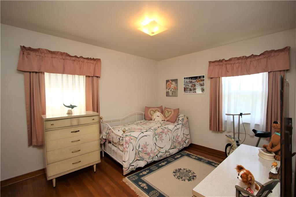 157 Taylor Run Road Monongahela, PA 15063 - Photo 18 of 42 2nd 12x10 Bedroom also featuring Hardwood Floors ad 2 Windows.