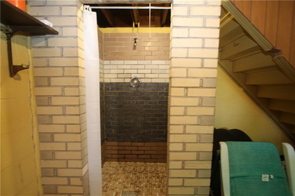 157 Taylor Run Road Monongahela, PA 15063 - Photo 24 of 42 Brick Shower Stall w/ Subway Tile in Laundry Room just off Game Room not far from Powder Room allowing for a Full Bathroom in Basement