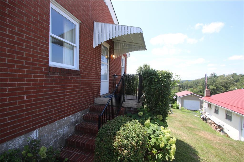 157 Taylor Run Road Monongahela, PA 15063 - Photo 31 of 42 Nice 6x5 Covered Side Porch w/ Newer Awning in July 2023