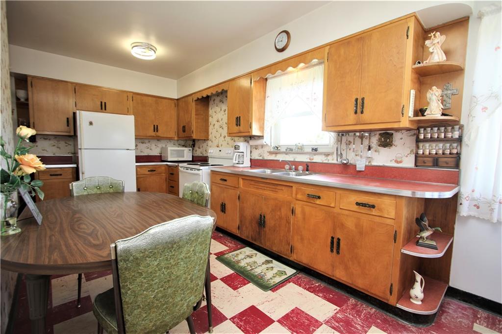 157 Taylor Run Road Monongahela, PA 15063 - Photo 9 of 42 Lots of Wood Cabinets in HUGE Eat-in Kitchen w/ Plenty of Windows for Natural Light. HUGE Shelved Pantry too!!