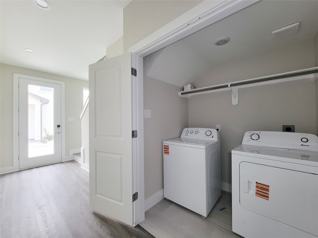 8316 Curry Road, Unit A Houston, TX 77093 - Photo 12 of 47 a view of utility room with washer and dryer