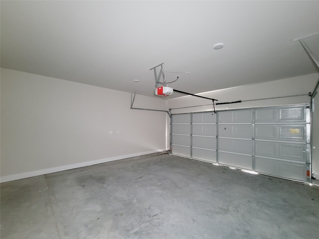 8316 Curry Road, Unit A Houston, TX 77093 - Photo 14 of 47 a view of a garage