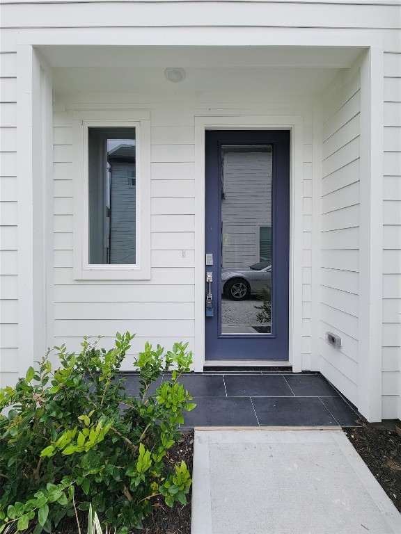 8316 Curry Road, Unit A Houston, TX 77093 - Photo 2 of 47 a front view of a house with a yard