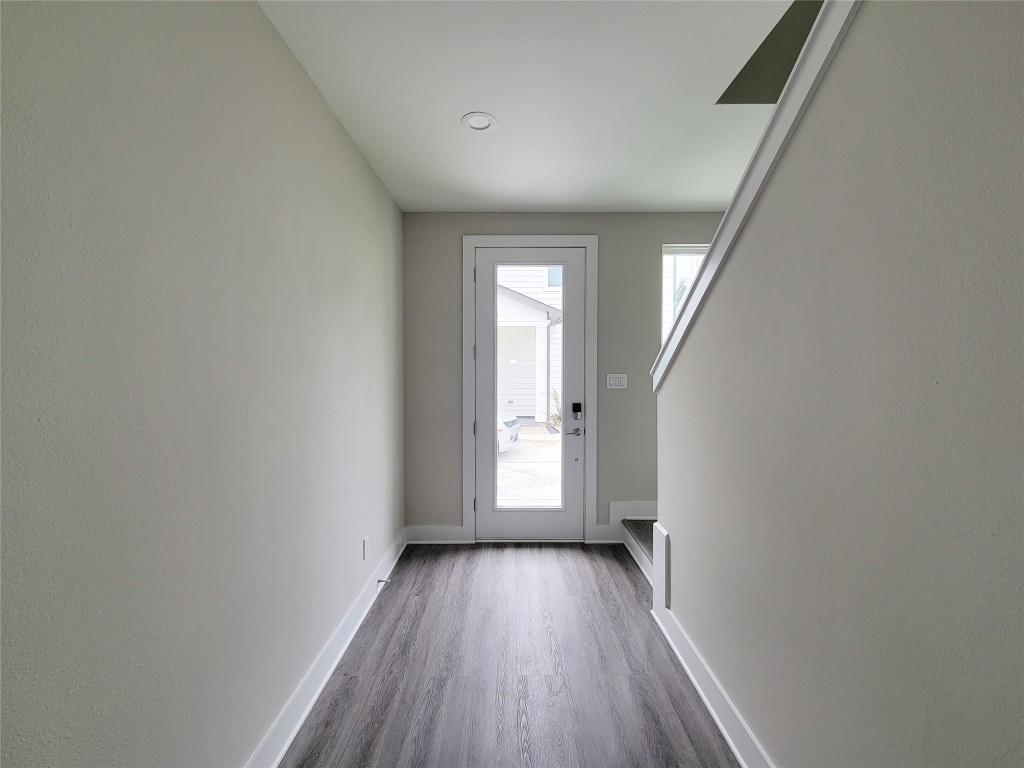 8316 Curry Road, Unit A Houston, TX 77093 - Photo 3 of 47 a view of a room with wooden floor and window