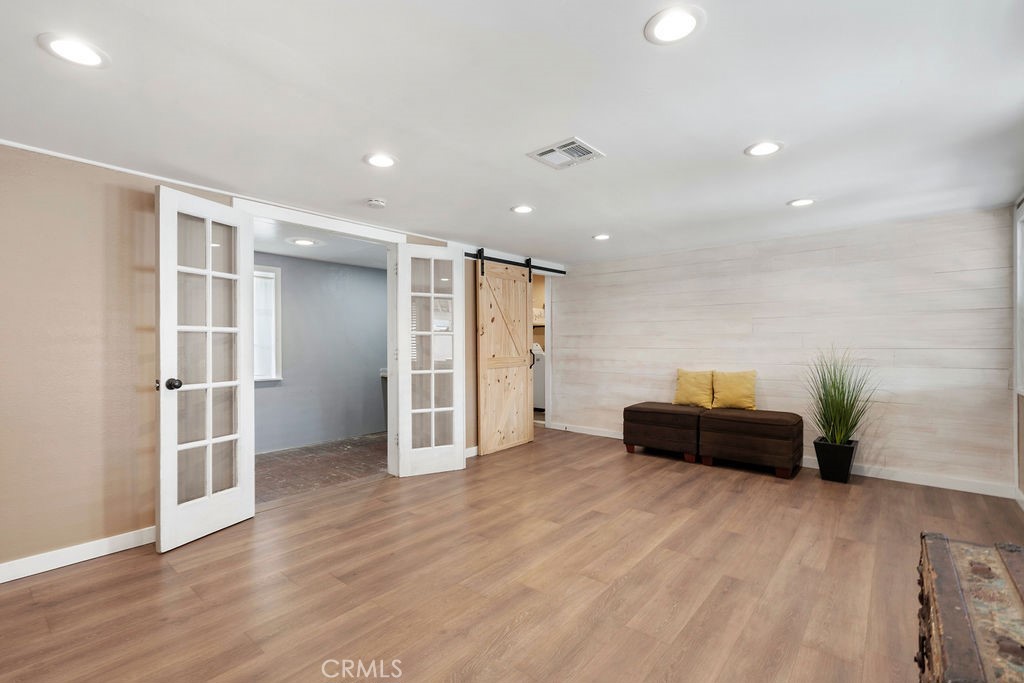 1338 Delay Avenue Glendora, CA 91740 - Photo 19 of 46 a view of empty room with wooden floor
