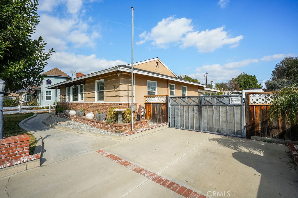 1338 Delay Avenue Glendora, CA 91740 - Photo 6 of 46 a view of a house with wooden fence