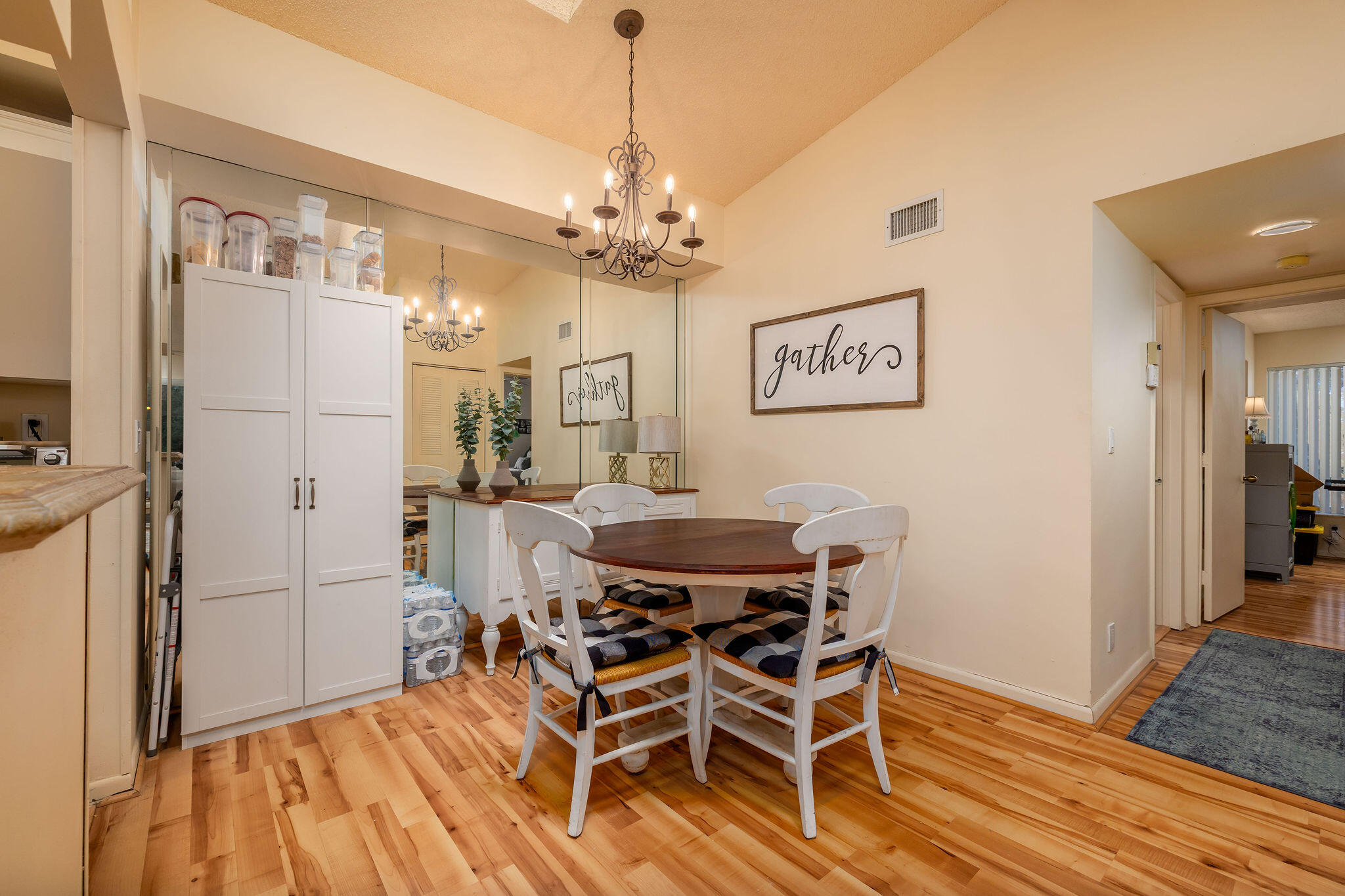 2500 Southeast Anchorage Cove, Unit D3 Port St. Lucie, FL 34952 - Photo 12 of 51 a view of a dining room with furniture and wooden floor