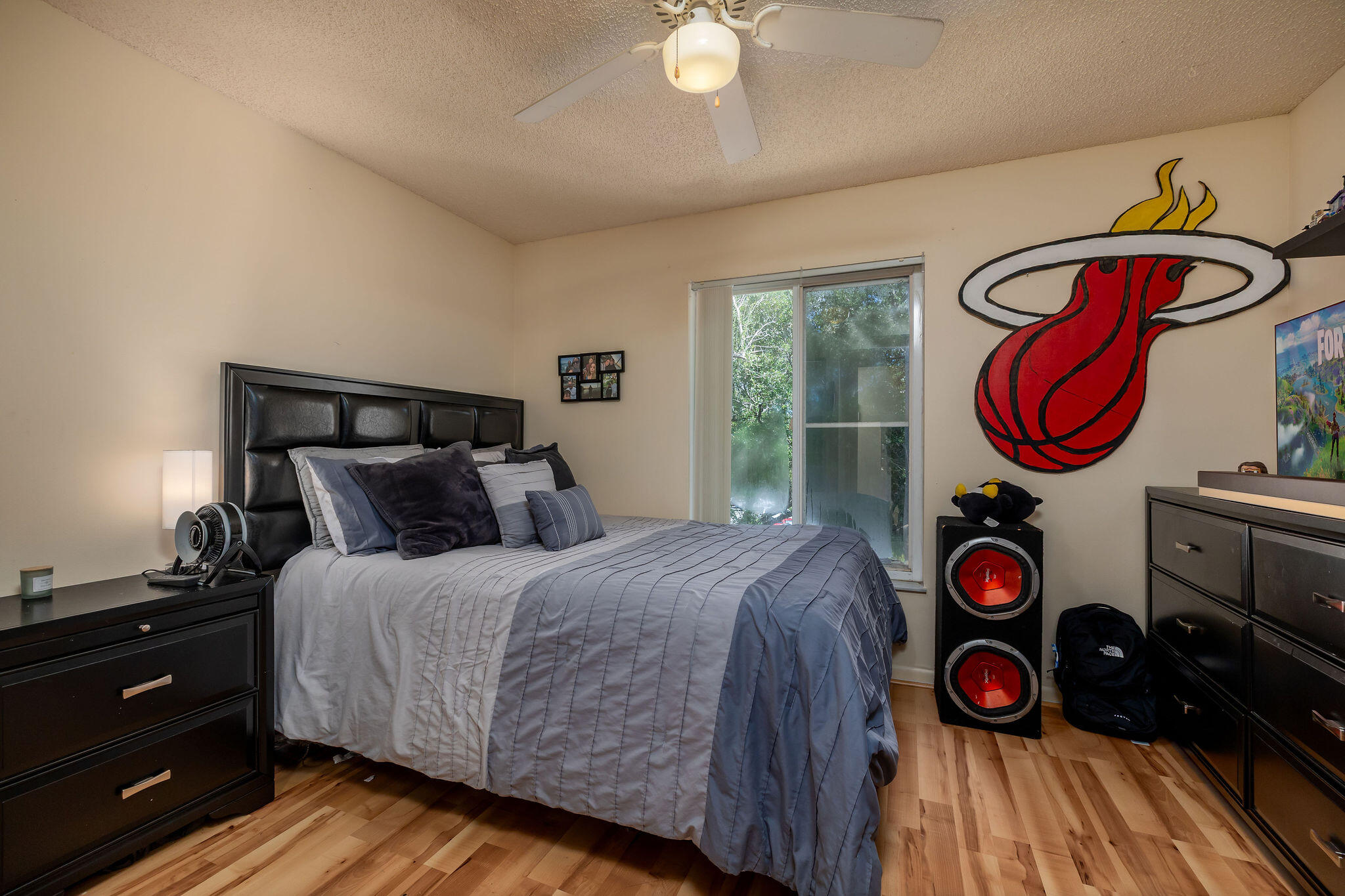 2500 Southeast Anchorage Cove, Unit D3 Port St. Lucie, FL 34952 - Photo 22 of 51 a bedroom with a bed and wooden floor