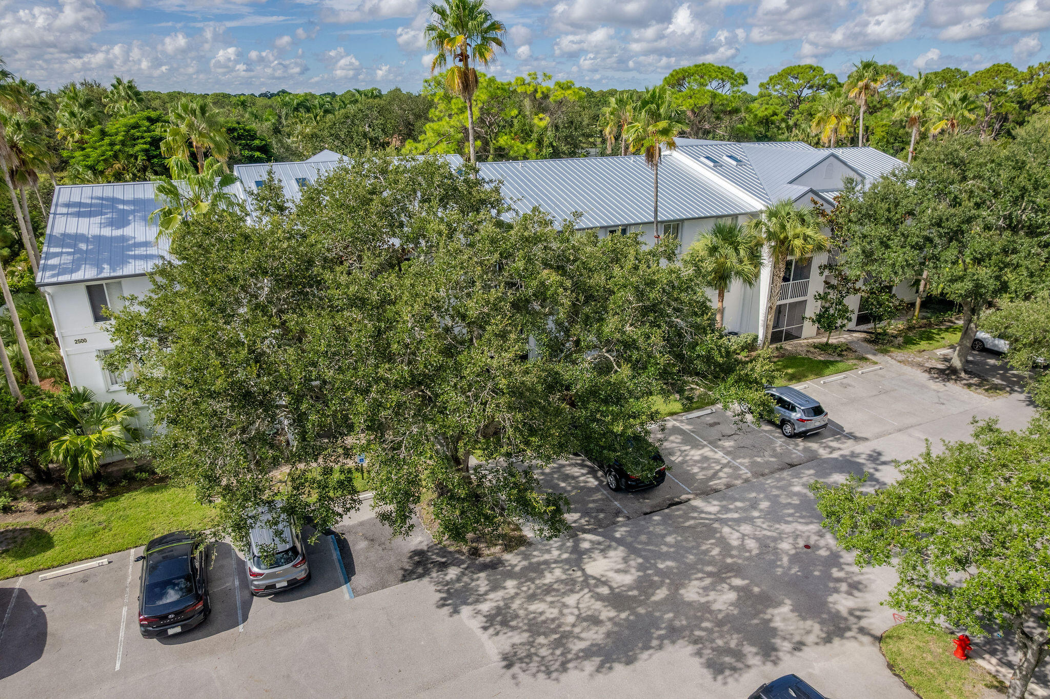 2500 Southeast Anchorage Cove, Unit D3 Port St. Lucie, FL 34952 - Photo 30 of 51 a view of a garden with a patio