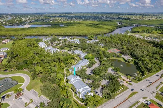 a view of outdoor space with a garden and trees