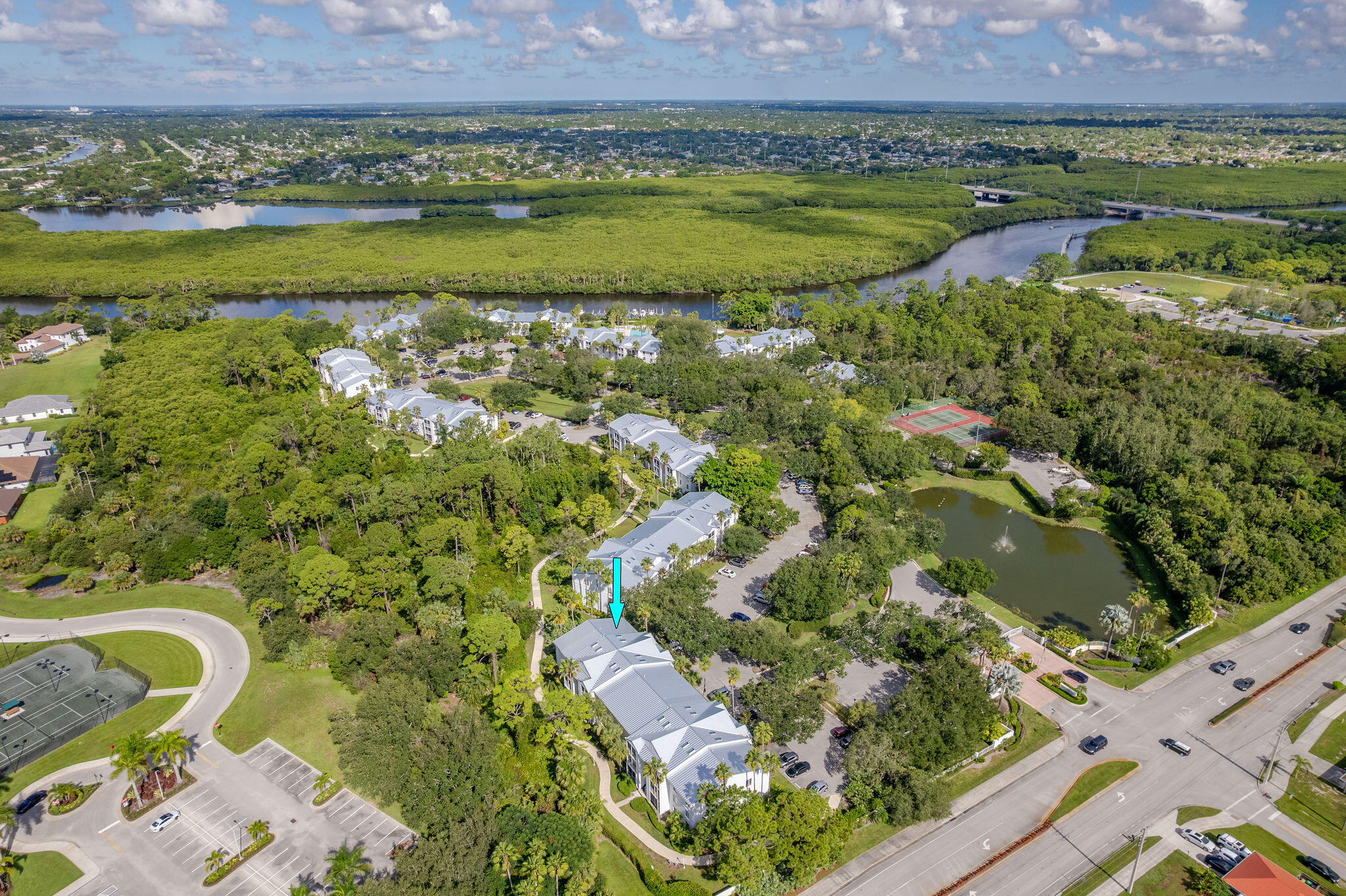 2500 Southeast Anchorage Cove, Unit D3 Port St. Lucie, FL 34952 - Photo 31 of 51 an aerial view of a residential houses with outdoor space and lake view