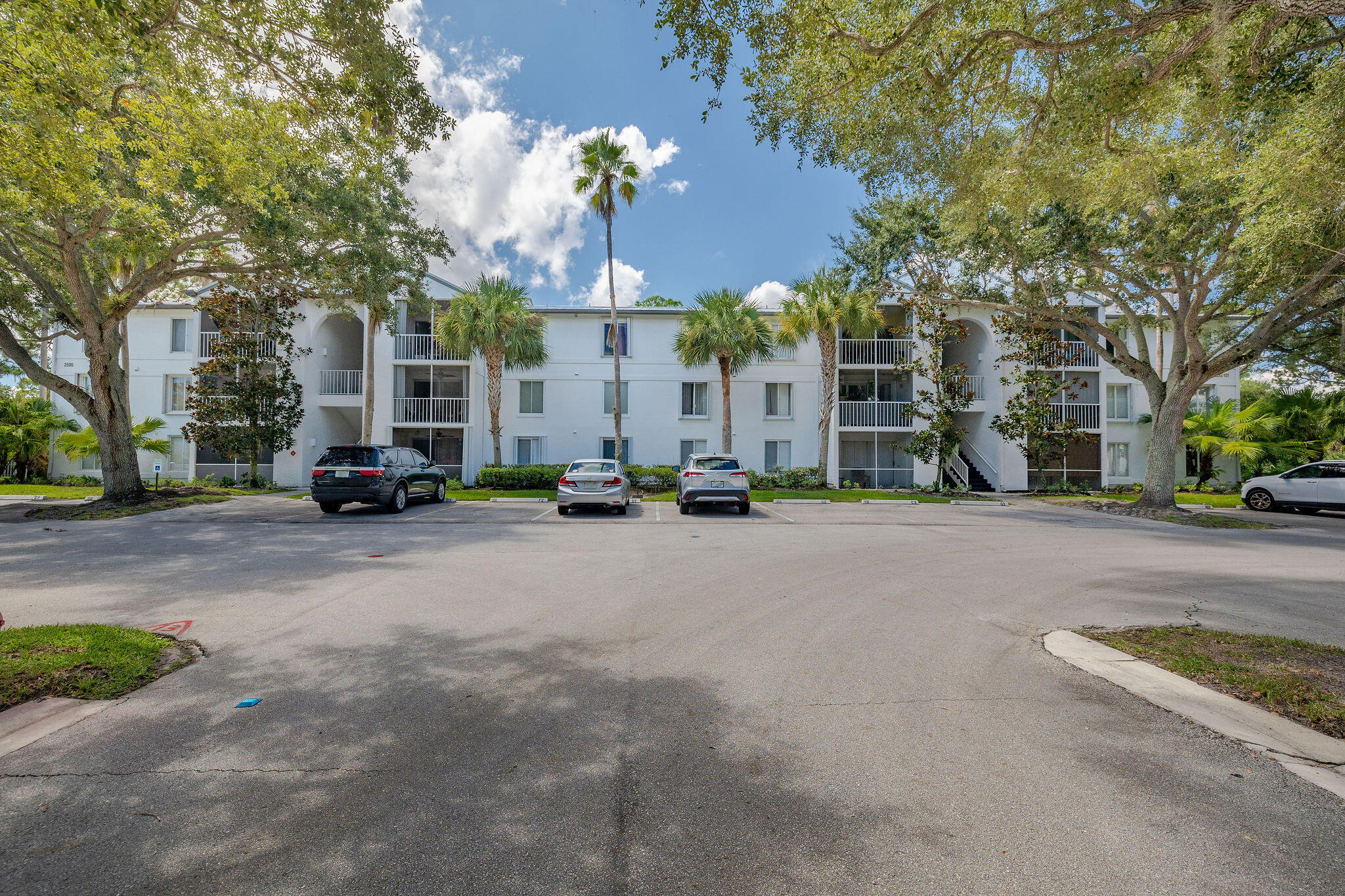 2500 Southeast Anchorage Cove, Unit D3 Port St. Lucie, FL 34952 - Photo 34 of 51 a view of a street with houses