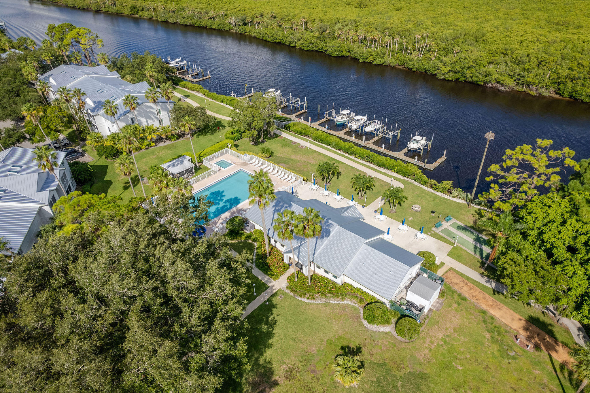 2500 Southeast Anchorage Cove, Unit D3 Port St. Lucie, FL 34952 - Photo 36 of 51 an aerial view of a house with a lake view