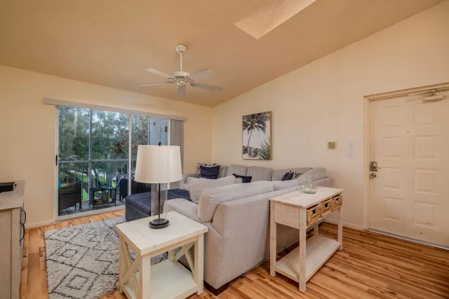 a living room with furniture and window