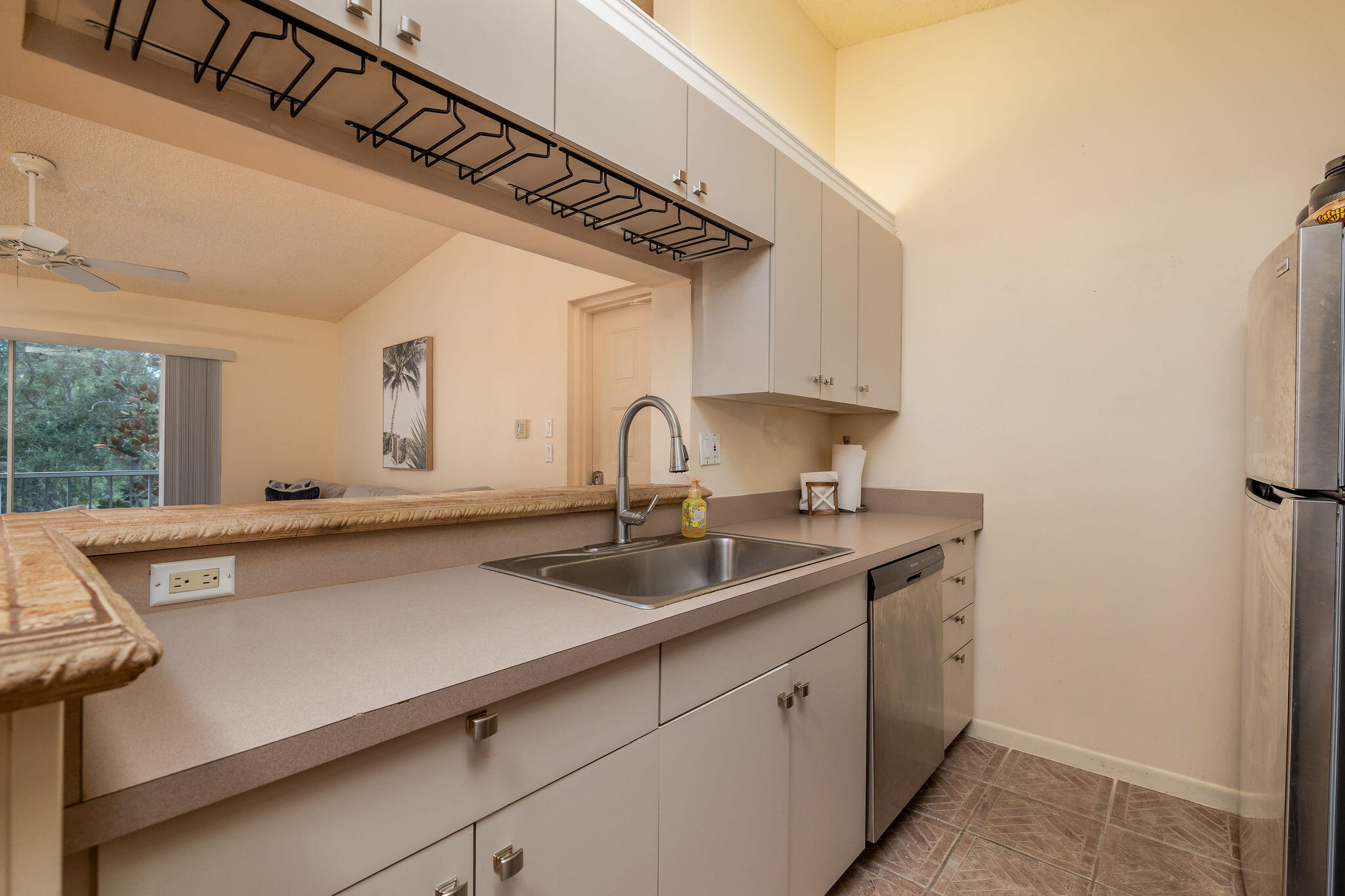 2500 Southeast Anchorage Cove, Unit D3 Port St. Lucie, FL 34952 - Photo 10 of 51 a kitchen with a sink and cabinets