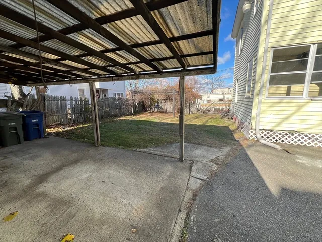 a view of empty room with sliding door