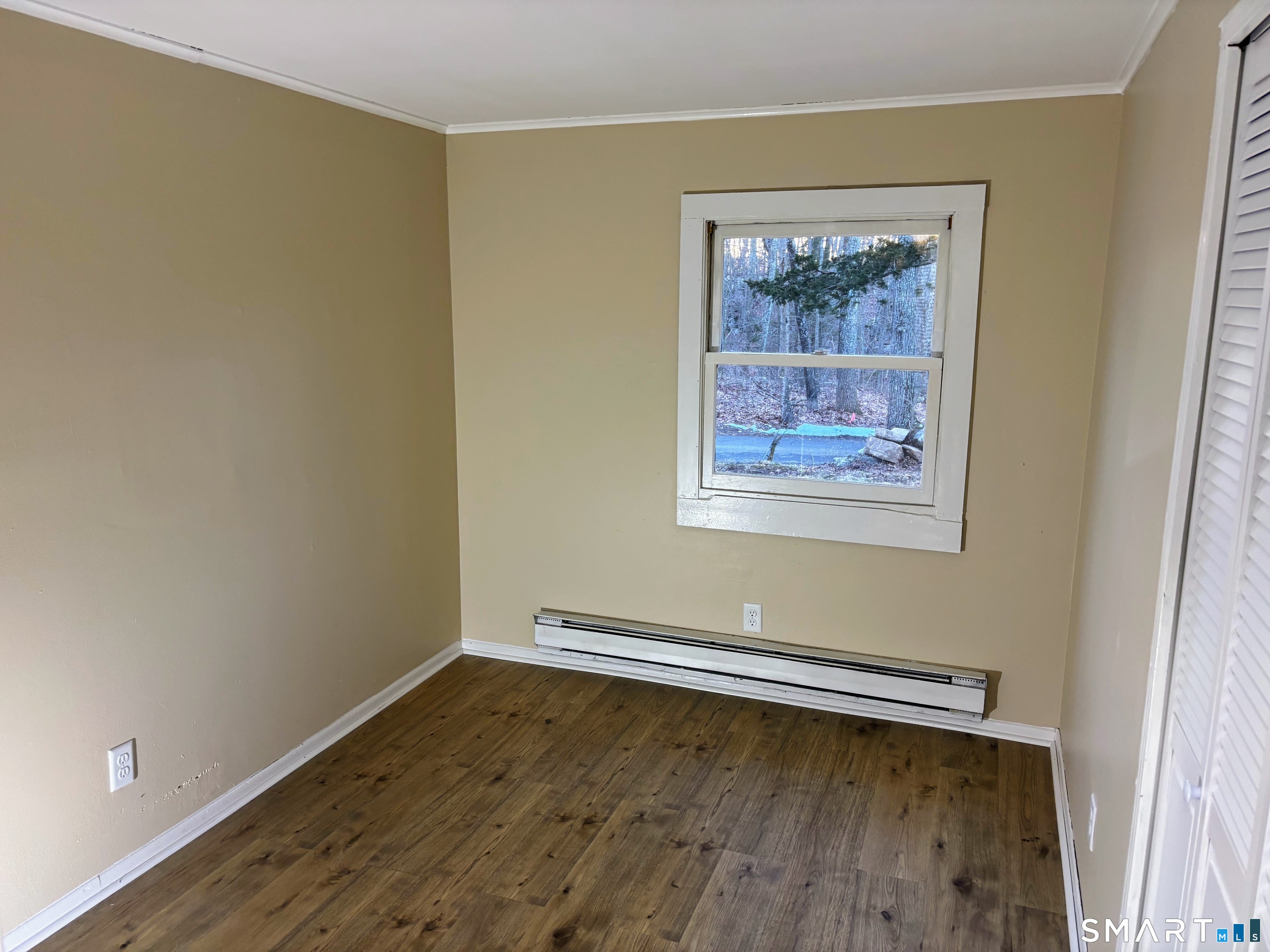 62 Rattling Valley Road Deep River, CT 06417 - Photo 12 of 19 a view of a room with wooden floor and window