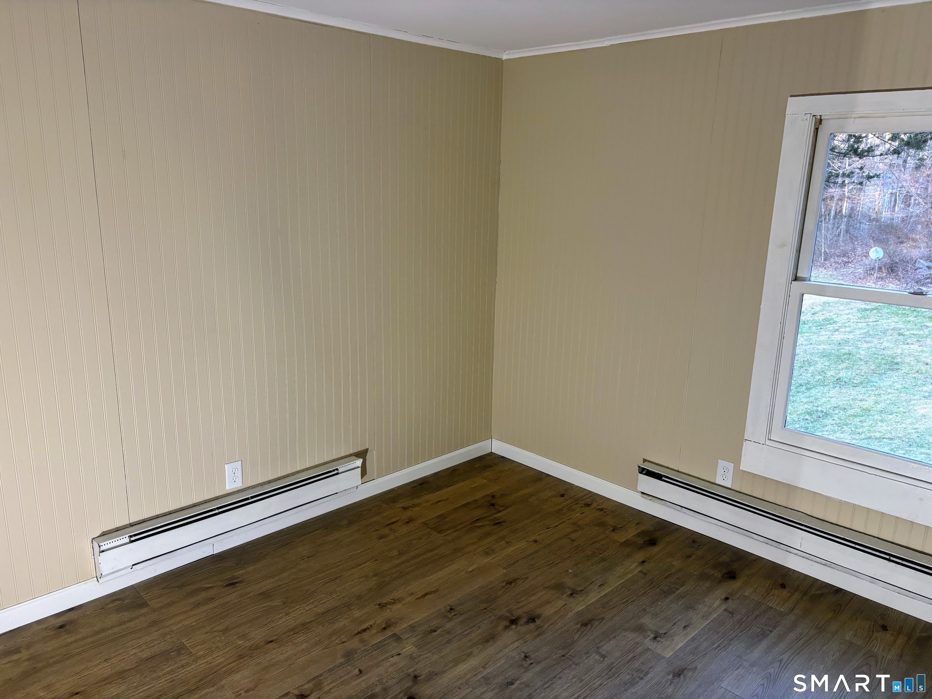 62 Rattling Valley Road Deep River, CT 06417 - Photo 14 of 19 a view of a room with wooden floor and a window