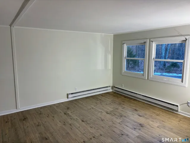 an empty room with windows