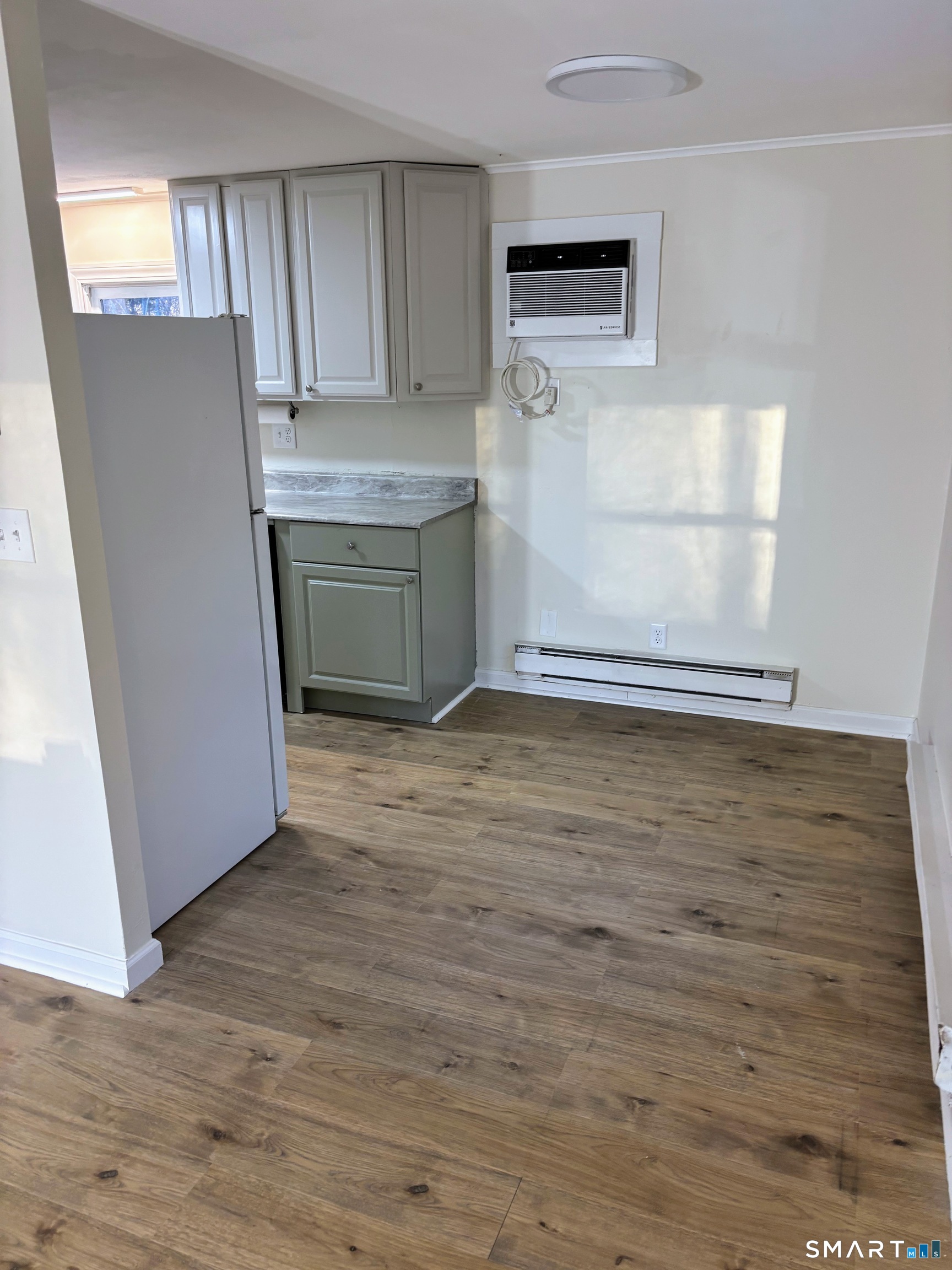 62 Rattling Valley Road Deep River, CT 06417 - Photo 9 of 19 a view of a kitchen cabinets and wooden floor