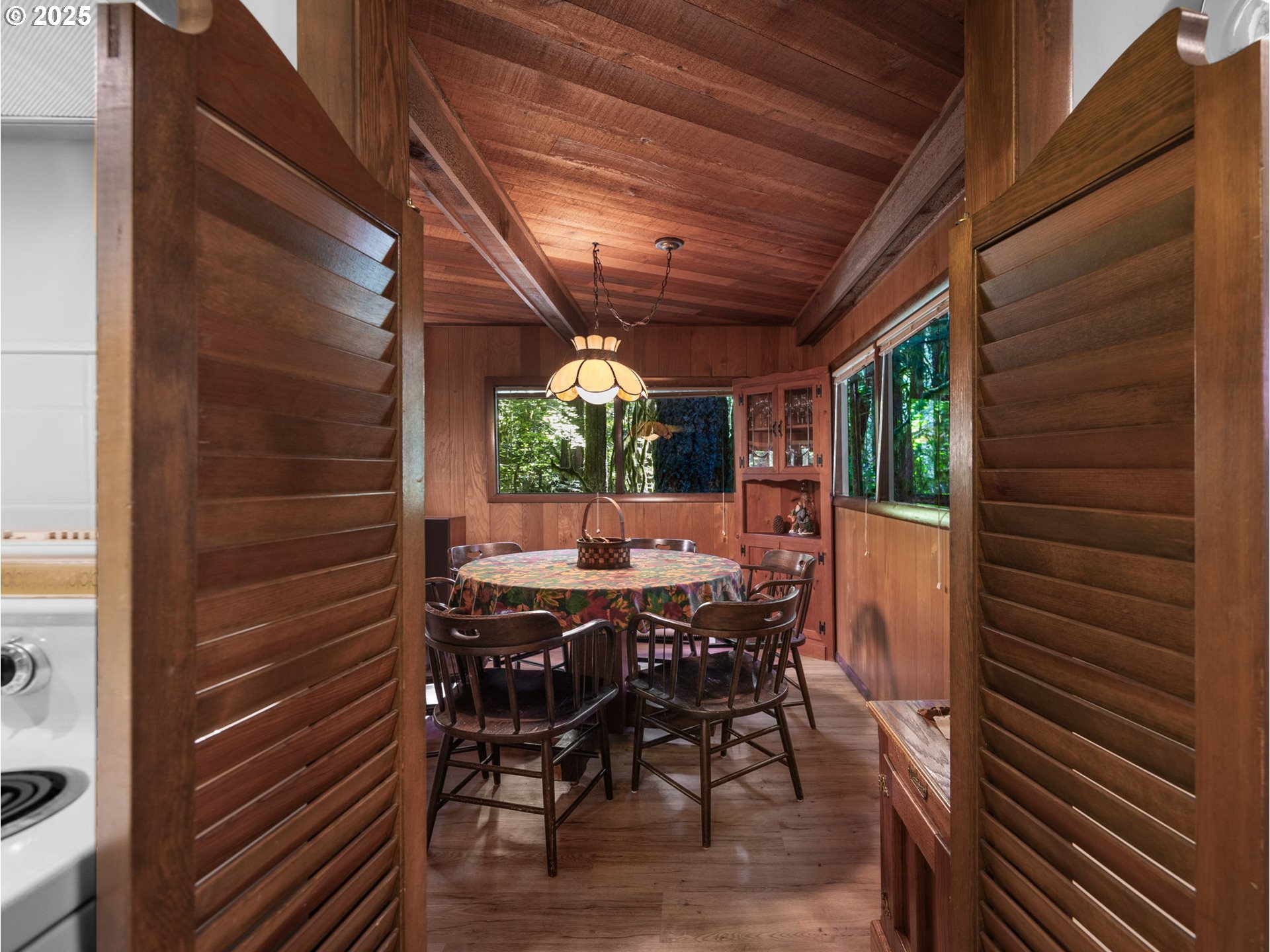 26811 East Road 15 Rhododendron, OR 97049 - Photo 11 of 47 a view of an outdoor space with a table and chairs