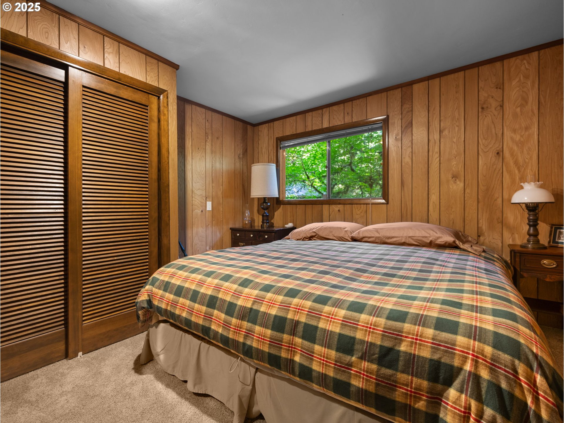 26811 East Road 15 Rhododendron, OR 97049 - Photo 23 of 47 a bedroom with a bed and a window