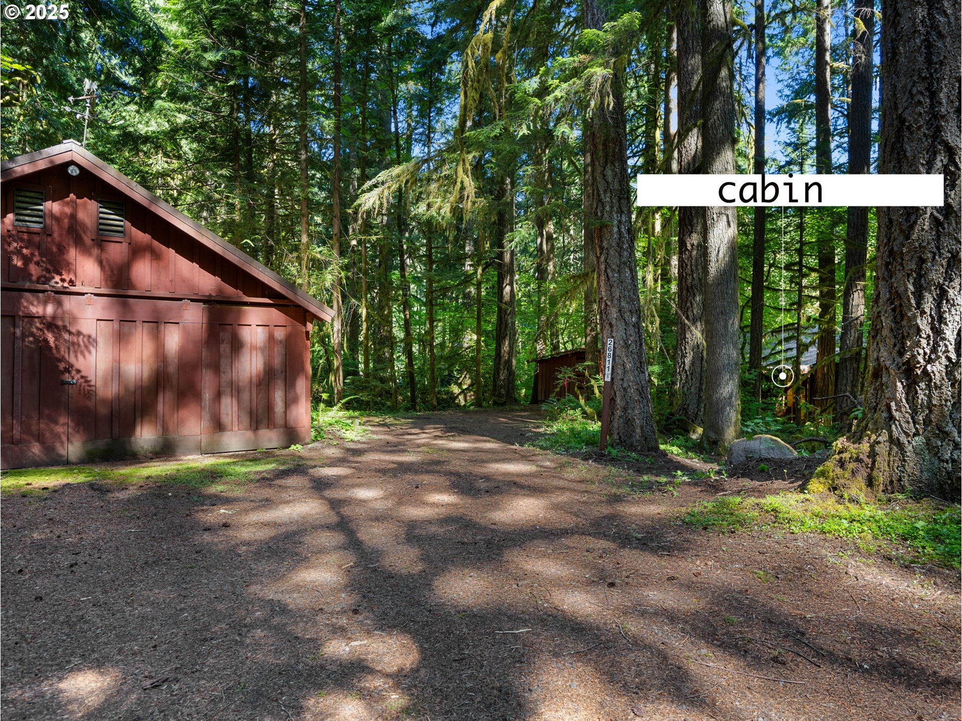26811 East Road 15 Rhododendron, OR 97049 - Photo 45 of 47 a sign that is on the side of a road