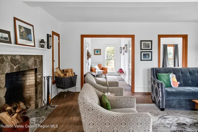 a bedroom with a large bed and a dresser