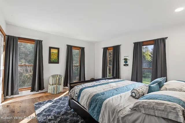 a kitchen with stainless steel appliances a stove a sink and a refrigerator