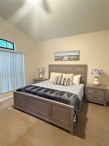 a view of swimming pool with a yard