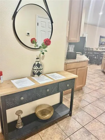 a view of kitchen island with furniture and wooden floor
