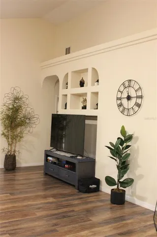 a view of a swimming pool with a yard