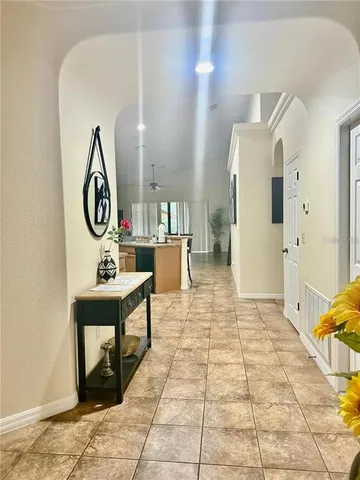 a bedroom with a bed and a night stand