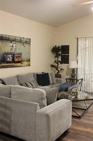 a bedroom with a bed and dresser