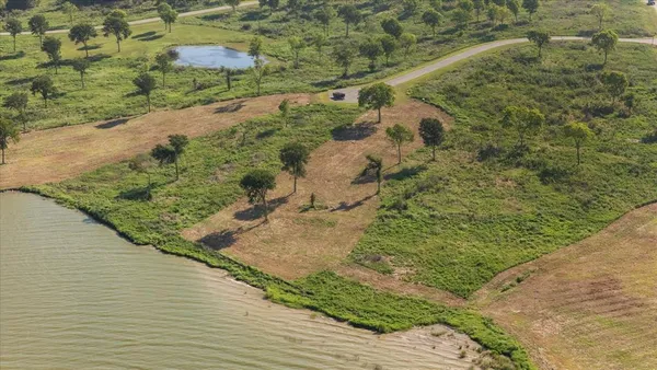 a view of a pathway both side of yard