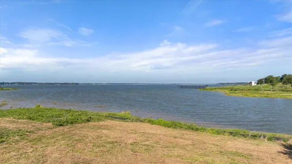 a view of a lake with a beach