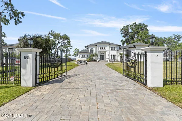 a view of a wrought iron bridge