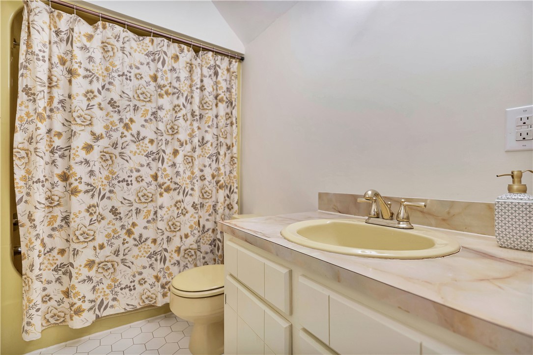 910 Chantilly Lane Anderson, SC 29625 - Photo 19 of 38 A well-maintained bathroom with a functional sink and tub, featuring crisp white walls.